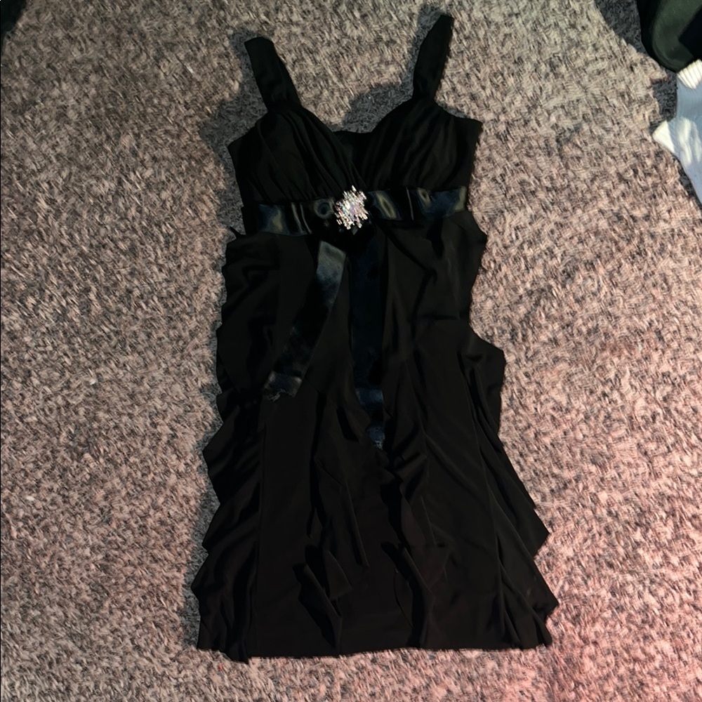 Elegant Black Dress with Embellished Detail